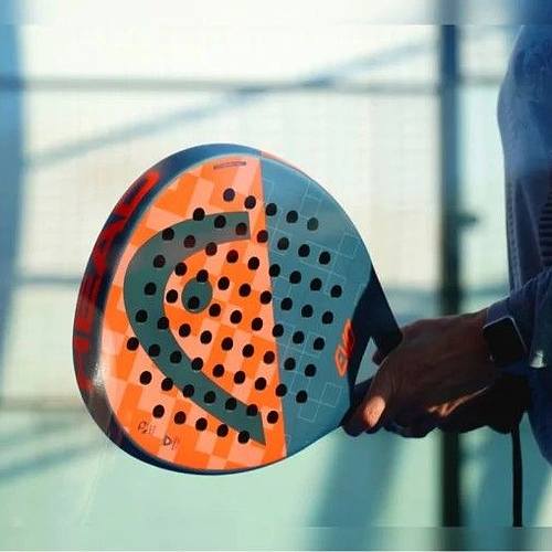 CLOSE-UP a person holding a paddle