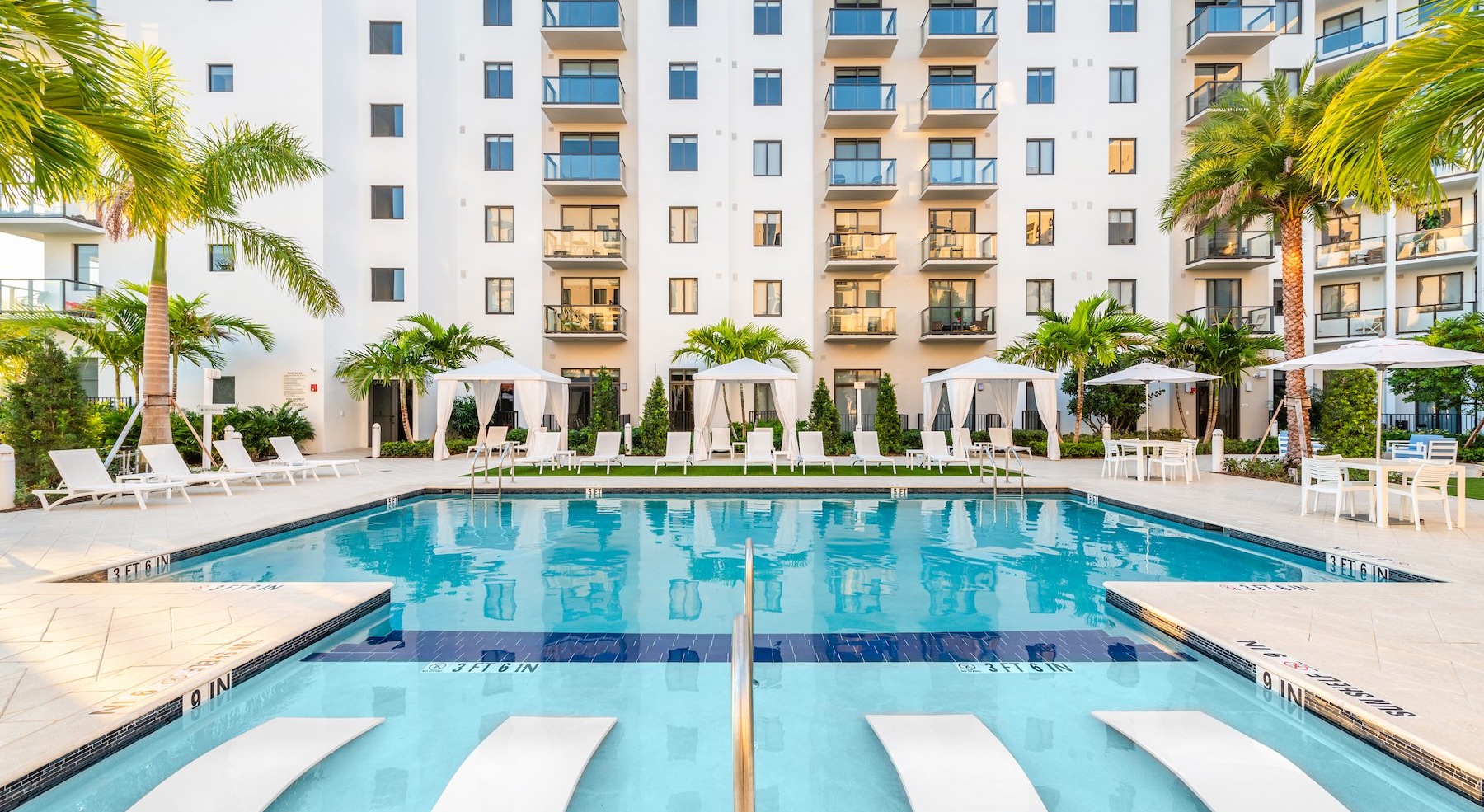 pool with lounge chairs