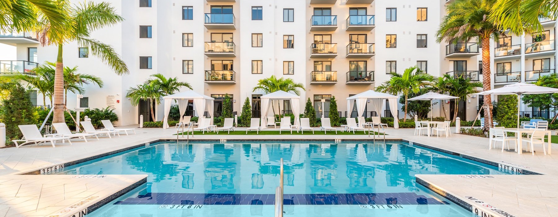 pool with lounge chairs