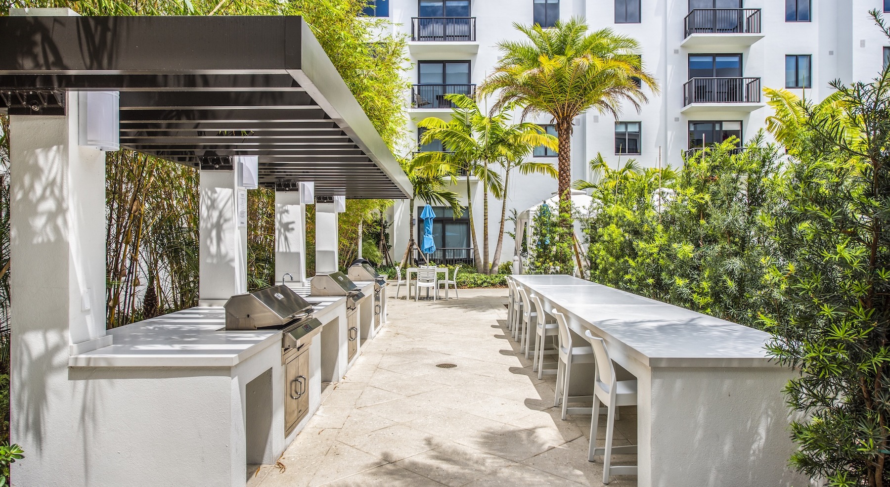 Grilling station and lush landscaping