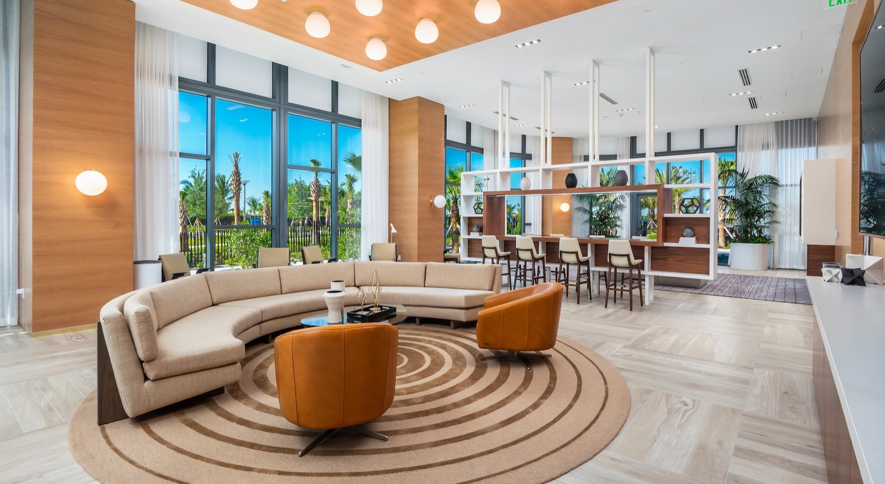 a clubroom with a couch and chairs