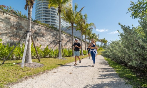 people running on a path outdoors