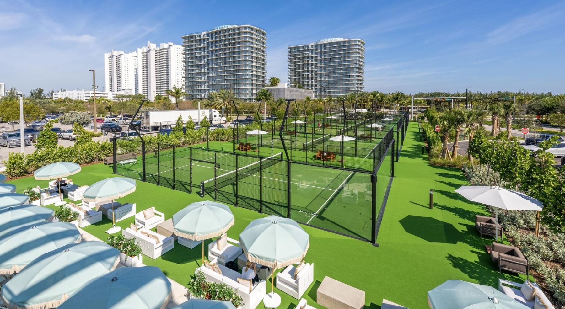 an aerial view of a group of tennis courts