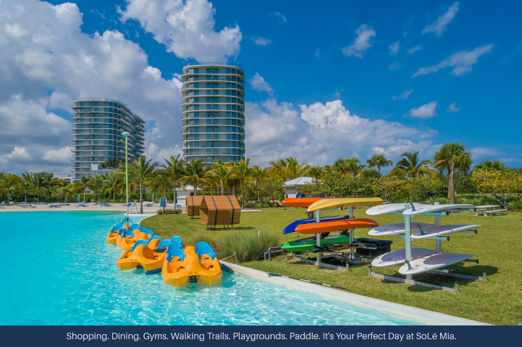 A beautiful community at the heart of all your passions a beach with kayaks